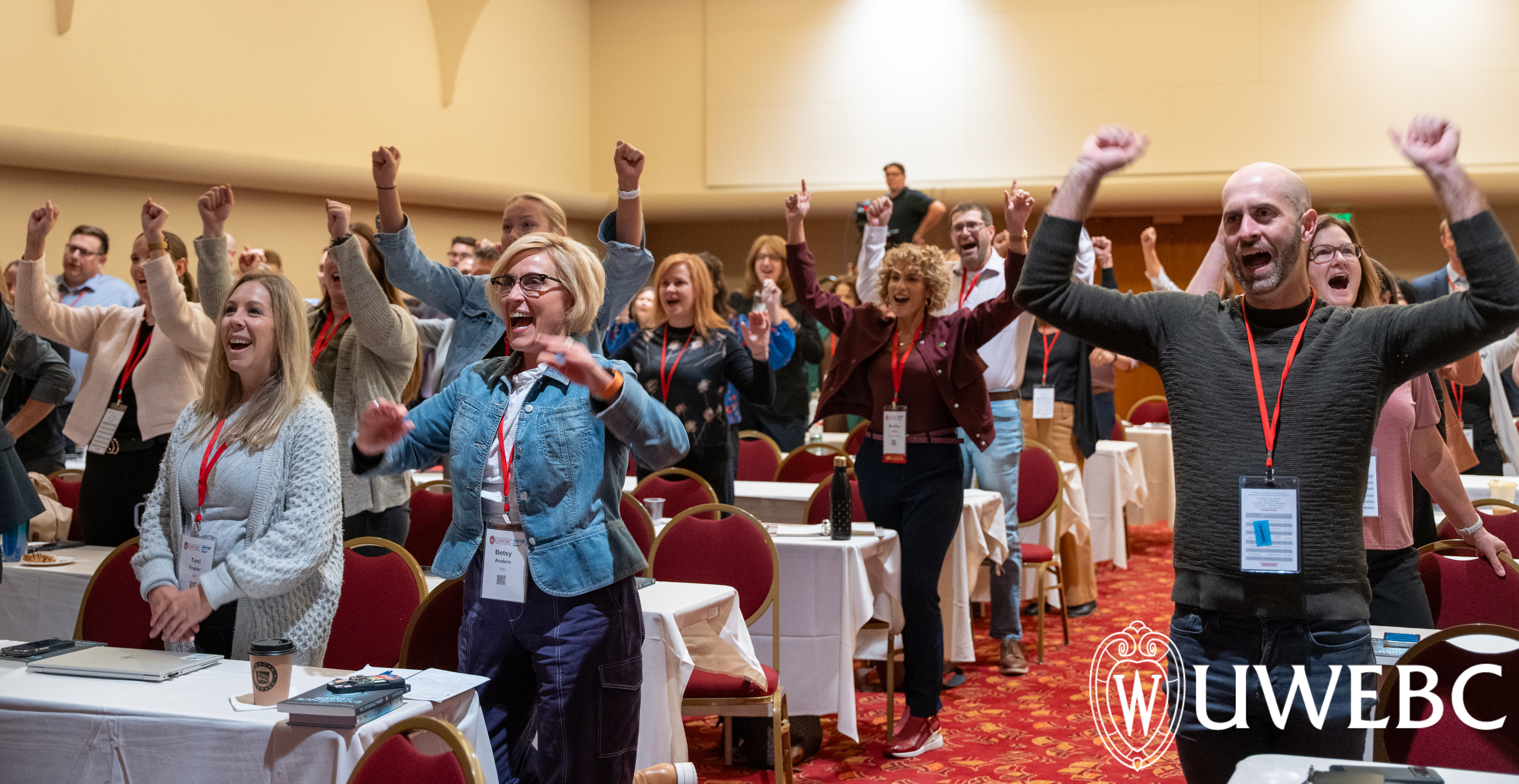 people cheering in a marketing session at the 2024 annual conference